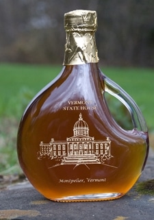 Sweet Retreat Sugarworks syrup bottle etched with the VT Statehouse