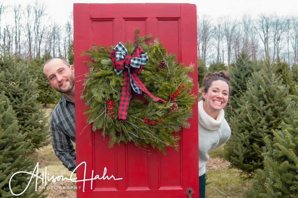 Nick and Stephanie Lussier in their Christmas Tree Farm at Maple Hill Farm Barton Vermont