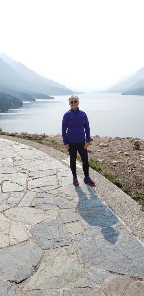 Pam Knights in front of Upper Waterton Lakes Canada